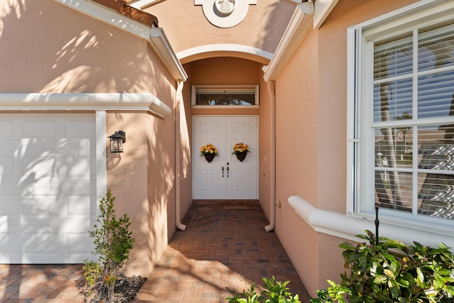 1629 SE Tradition Trce, Stuart, FL 34997 - property entrance featuring stucco siding