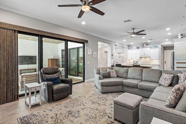 12209 Boca Reserve Ln, Boca Raton, FL 33428 - living area featuring ceiling fan, ornamental molding, light wood-style flooring, recessed lighting, and baseboards
