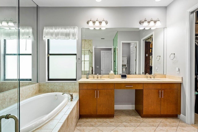 12209 Boca Reserve Ln, Boca Raton, FL 33428 - full bathroom featuring double vanity, healthy amount of natural light, a garden tub, and a stall shower