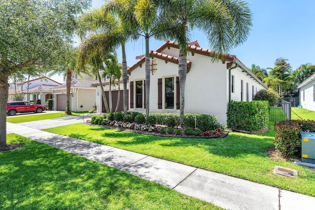 12209 Boca Reserve Ln, Boca Raton, FL 33428 - mediterranean / spanish home featuring driveway, a tile roof, stucco siding, and an attached garage