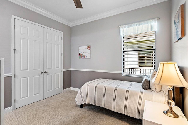 12209 Boca Reserve Ln, Boca Raton, FL 33428 - bedroom featuring carpet flooring, ornamental molding, baseboards, ceiling fan, and a closet