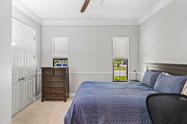 12209 Boca Reserve Ln, Boca Raton, FL 33428 - carpeted bedroom featuring crown molding, a ceiling fan, baseboards, and a closet