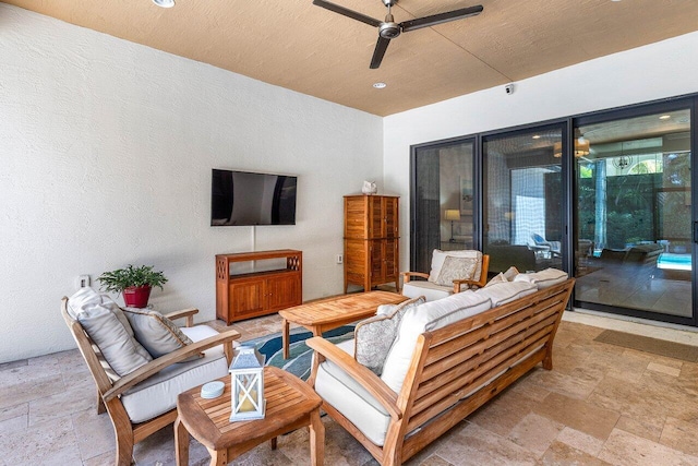 12209 Boca Reserve Ln, Boca Raton, FL 33428 - living room featuring stone tile floors and ceiling fan