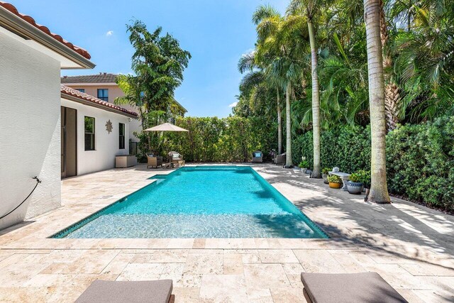 12209 Boca Reserve Ln, Boca Raton, FL 33428 - outdoor pool featuring a patio area