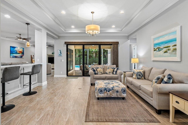 12209 Boca Reserve Ln, Boca Raton, FL 33428 - living area with a raised ceiling, a ceiling fan, crown molding, baseboards, and recessed lighting