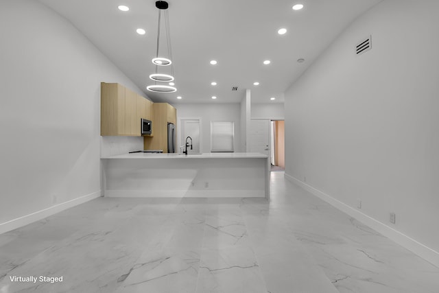 8269 Springtree Rd, Boca Raton, FL 33496 - unfurnished living room featuring recessed lighting, light marble finish flooring, a sink, and baseboards