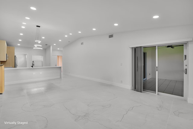8269 Springtree Rd, Boca Raton, FL 33496 - unfurnished living room featuring light marble finish flooring, recessed lighting, a sink, baseboards, and vaulted ceiling