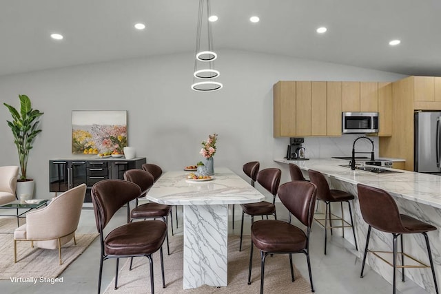 8269 Springtree Rd, Boca Raton, FL 33496 - dining room featuring vaulted ceiling and recessed lighting