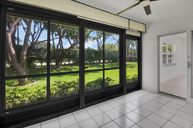 8269 Springtree Rd, Boca Raton, FL 33496 - unfurnished sunroom featuring ceiling fan and healthy amount of natural light