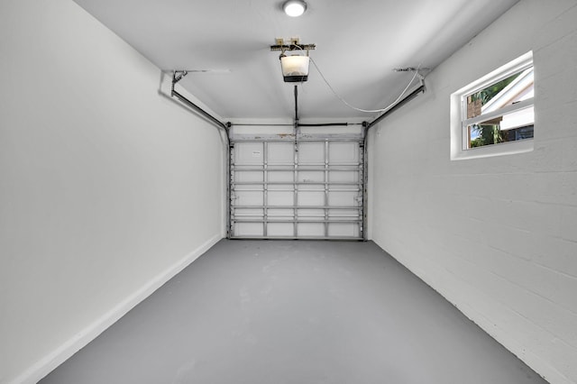 8269 Springtree Rd, Boca Raton, FL 33496 - garage featuring a garage door opener