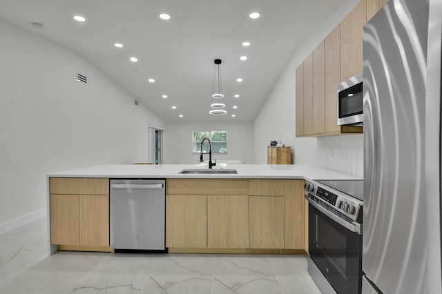 8269 Springtree Rd, Boca Raton, FL 33496 - kitchen with appliances with stainless steel finishes, a sink, modern cabinets, recessed lighting, and light countertops