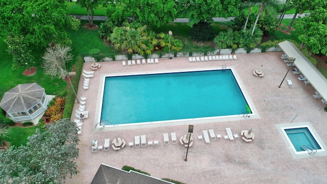 8269 Springtree Rd, Boca Raton, FL 33496 - community pool with a patio