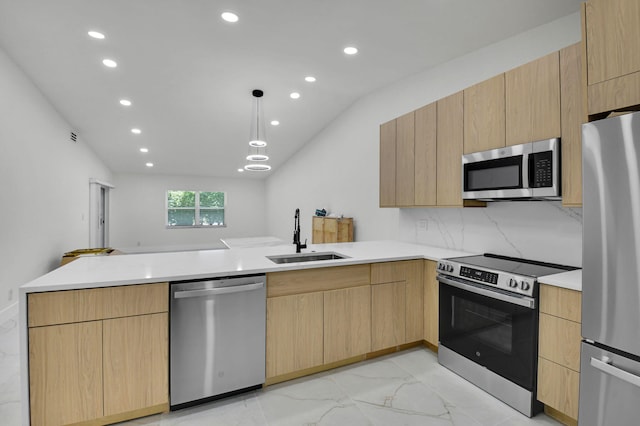 8269 Springtree Rd, Boca Raton, FL 33496 - kitchen featuring appliances with stainless steel finishes, a sink, a peninsula, light brown cabinetry, and light marble finish floors
