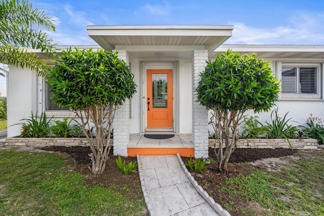 1428 N M St, Lake Worth Beach, FL 33460 - view of exterior entry featuring brick siding