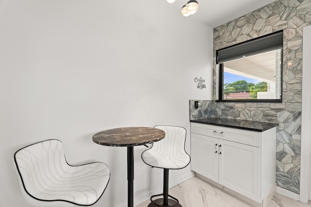 1428 N M St, Lake Worth Beach, FL 33460 - dining room with light marble finish flooring