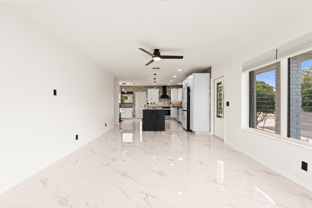 1428 N M St, Lake Worth Beach, FL 33460 - unfurnished living room featuring light marble finish floors, ceiling fan, baseboards, and recessed lighting
