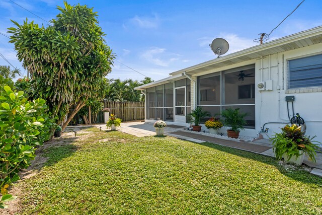 1428 N M St, Lake Worth Beach, FL 33460 - view of yard with a sunroom