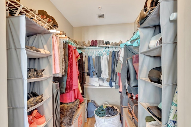 550 Okeechobee Blvd Unit 821, West Palm Beach, FL 33401 - walk in closet featuring wood finished floors