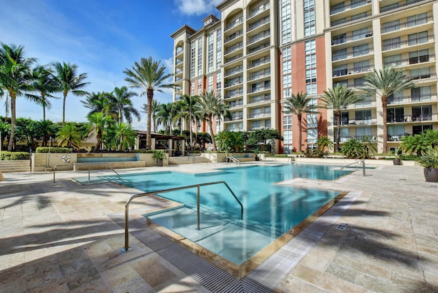 550 Okeechobee Blvd Unit 821, West Palm Beach, FL 33401 - community pool featuring a patio area