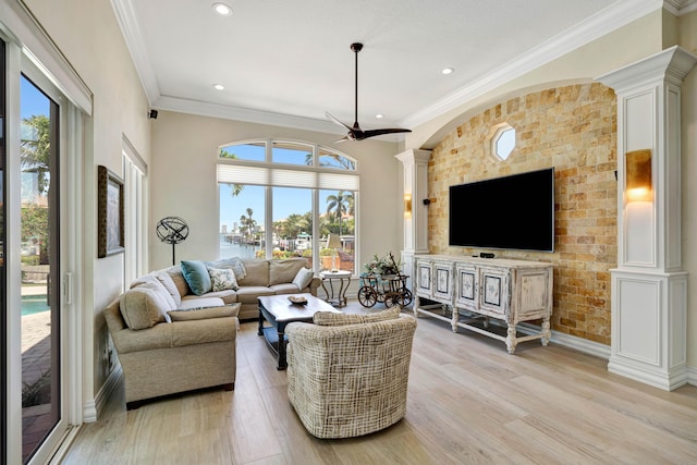506 Corsair Dr, North Palm Beach, FL 33408 - living room featuring ornate columns, light wood-style floors, crown molding, baseboards, and recessed lighting