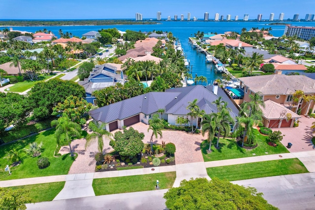 506 Corsair Dr, North Palm Beach, FL 33408 - aerial perspective of suburban area with a nearby body of water