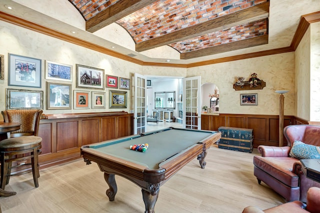 506 Corsair Dr, North Palm Beach, FL 33408 - rec room with brick ceiling, pool table, lofted ceiling, arched walkways, and a wainscoted wall