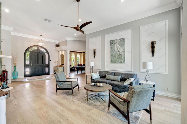 506 Corsair Dr, North Palm Beach, FL 33408 - living area with healthy amount of natural light, recessed lighting, light wood finished floors, ceiling fan, and crown molding
