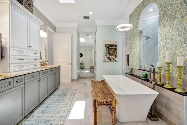 506 Corsair Dr, North Palm Beach, FL 33408 - bathroom with a freestanding tub, vanity, ornamental molding, a shower, and baseboards