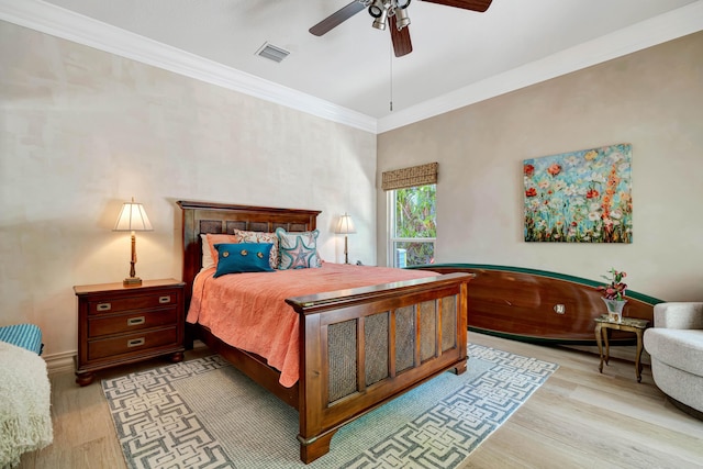 506 Corsair Dr, North Palm Beach, FL 33408 - bedroom with light wood-type flooring, ornamental molding, ceiling fan, and baseboards