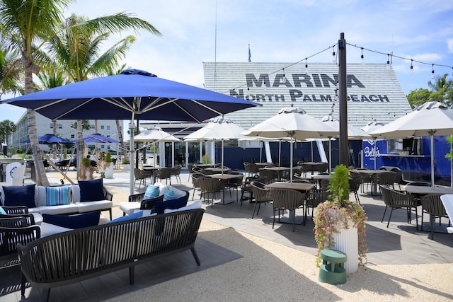 506 Corsair Dr, North Palm Beach, FL 33408 - view of patio featuring an outdoor living space