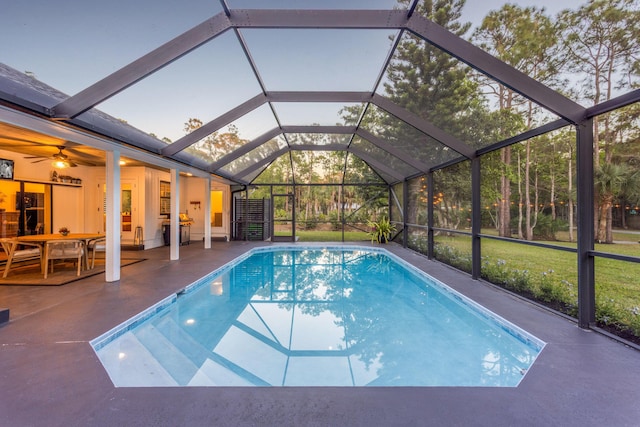 9544 Mockingbird Trl, Jupiter, FL 33478 - swimming pool featuring a patio area and glass enclosure