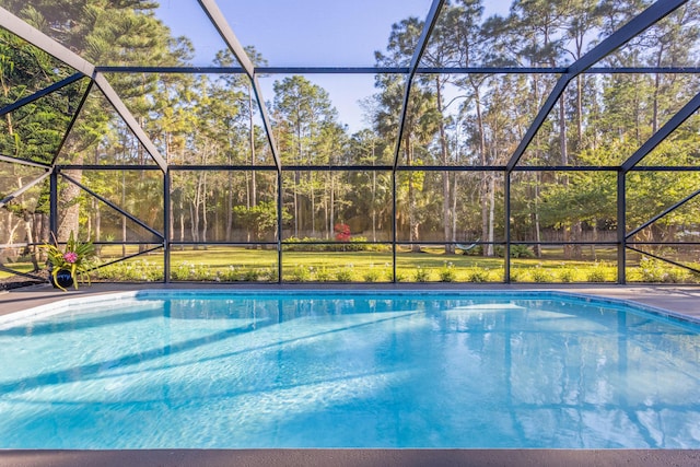 9544 Mockingbird Trl, Jupiter, FL 33478 - outdoor pool featuring glass enclosure