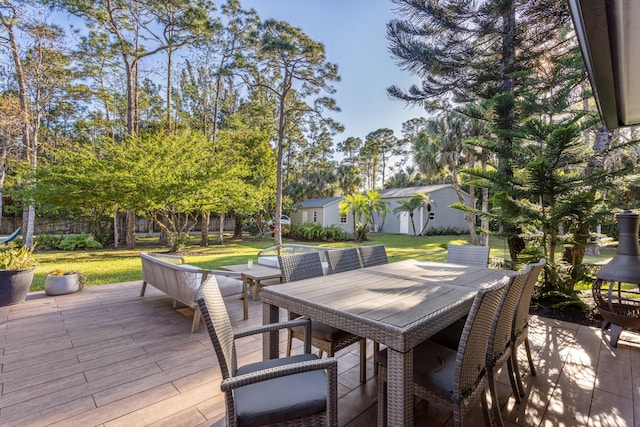 9544 Mockingbird Trl, Jupiter, FL 33478 - wooden terrace with a patio area and a yard