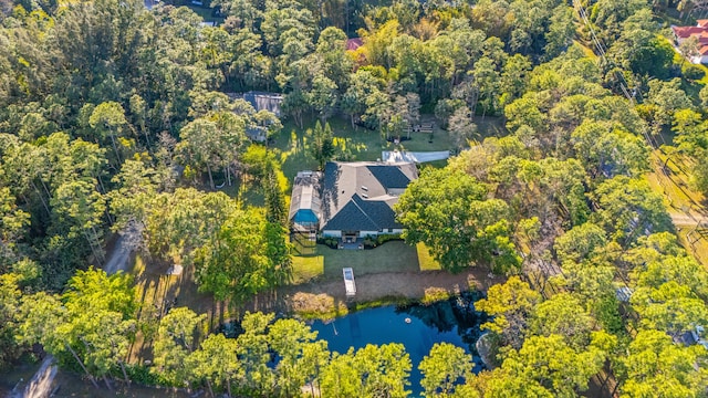 9544 Mockingbird Trl, Jupiter, FL 33478 - aerial view of property's location featuring a heavily wooded area and a nearby body of water