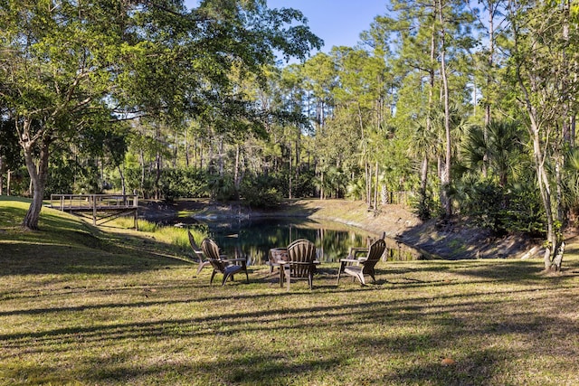 9544 Mockingbird Trl, Jupiter, FL 33478 - view of green lawn featuring a water view