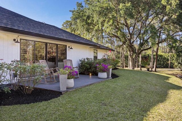9544 Mockingbird Trl, Jupiter, FL 33478 - view of grassy yard with a deck
