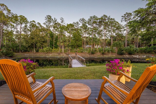 9544 Mockingbird Trl, Jupiter, FL 33478 - wooden terrace featuring a lawn and view of scattered trees