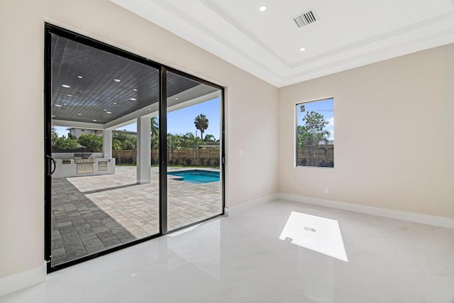 2929 Lorene Dr, Palm Springs, FL 33461 - tiled spare room featuring recessed lighting, baseboards, and a tray ceiling