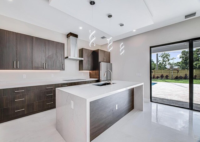 2929 Lorene Dr, Palm Springs, FL 33461 - kitchen with modern cabinets, wall chimney exhaust hood, dark brown cabinetry, light countertops, and recessed lighting