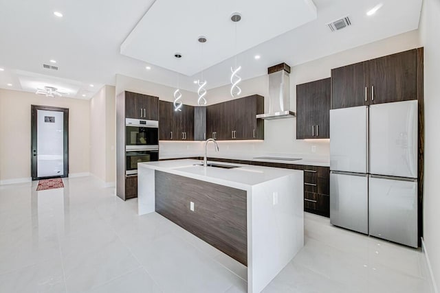 2929 Lorene Dr, Palm Springs, FL 33461 - kitchen featuring freestanding refrigerator, double oven, a sink, wall chimney exhaust hood, and modern cabinets