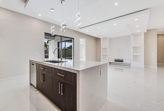 2929 Lorene Dr, Palm Springs, FL 33461 - kitchen featuring a sink, modern cabinets, dark brown cabinetry, light countertops, and recessed lighting