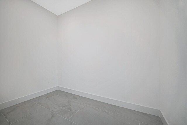 2929 Lorene Dr, Palm Springs, FL 33461 - unfurnished room featuring baseboards