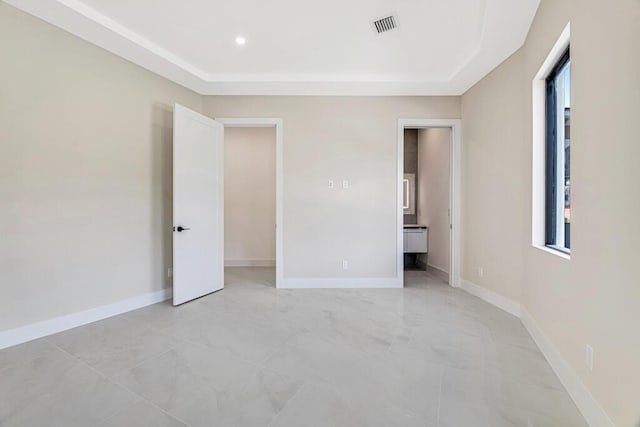 2929 Lorene Dr, Palm Springs, FL 33461 - unfurnished bedroom with a tray ceiling, baseboards, and recessed lighting