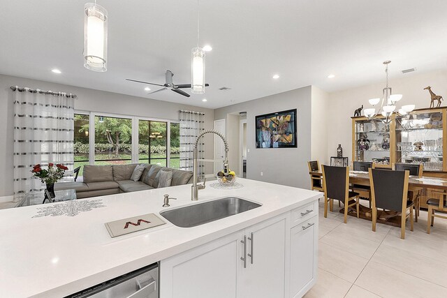 9319 Silver Shores Ln, Boynton Beach, FL 33473 - kitchen featuring a sink, dishwasher, light countertops, open floor plan, and recessed lighting