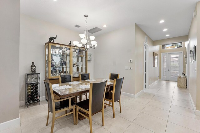 9319 Silver Shores Ln, Boynton Beach, FL 33473 - dining area with a chandelier, baseboards, recessed lighting, and light tile patterned floors