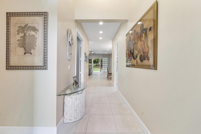 9319 Silver Shores Ln, Boynton Beach, FL 33473 - hall featuring light tile patterned floors, baseboards, and recessed lighting