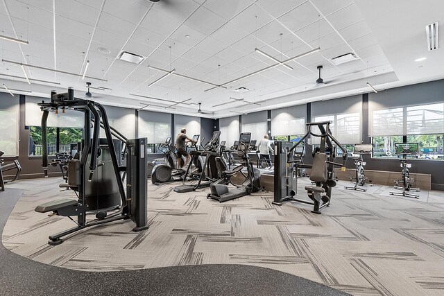 9319 Silver Shores Ln, Boynton Beach, FL 33473 - exercise room with carpet and healthy amount of natural light