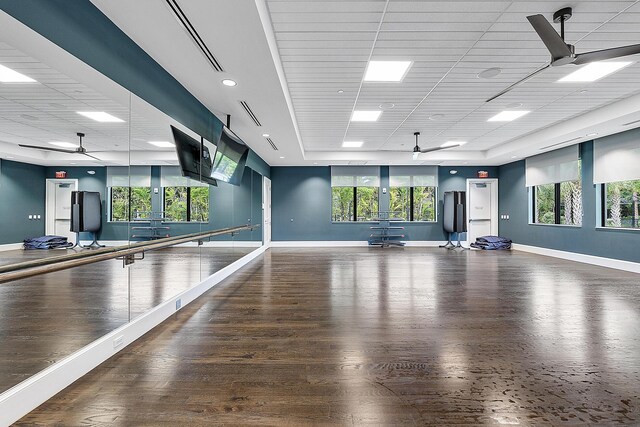9319 Silver Shores Ln, Boynton Beach, FL 33473 - exercise area with ceiling fan, baseboards, wood finished floors, and a paneled ceiling