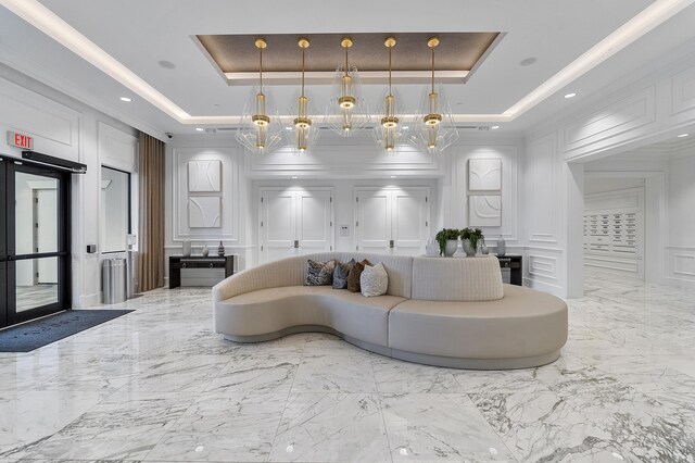 9319 Silver Shores Ln, Boynton Beach, FL 33473 - community lobby with a decorative wall and crown molding