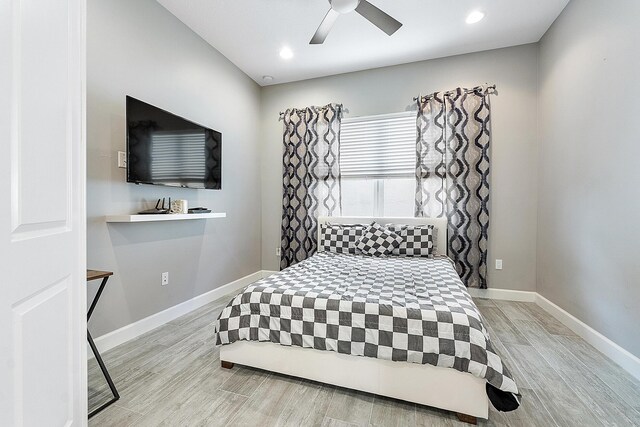9319 Silver Shores Ln, Boynton Beach, FL 33473 - bedroom featuring light wood-style flooring, baseboards, a ceiling fan, and recessed lighting
